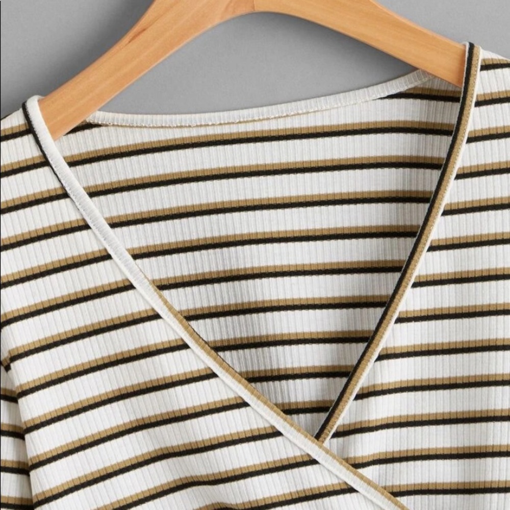 A beautiful toned long sleeve crop top